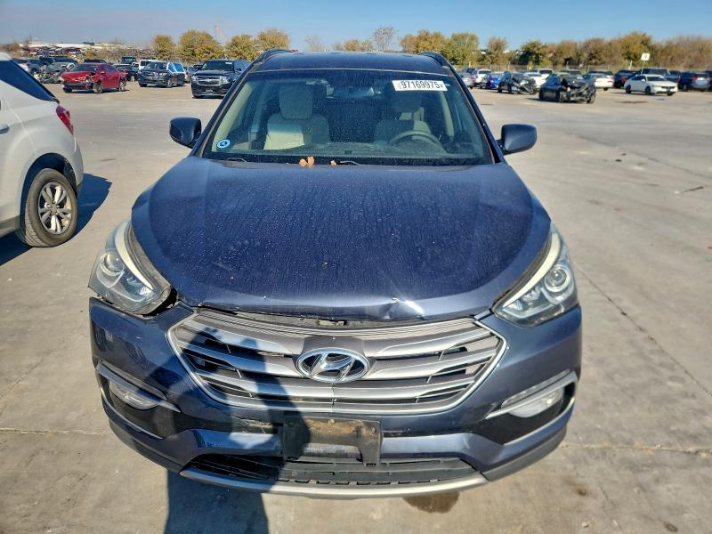 Photo 5 from auction – 2017 HYUNDAI SANTA FE S with VIN 5NMZU3LB2HH025892