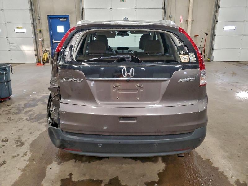 Photo 6 from auction – 2012 HONDA CR-V EXL with VIN 5J6RM4H72CL040484