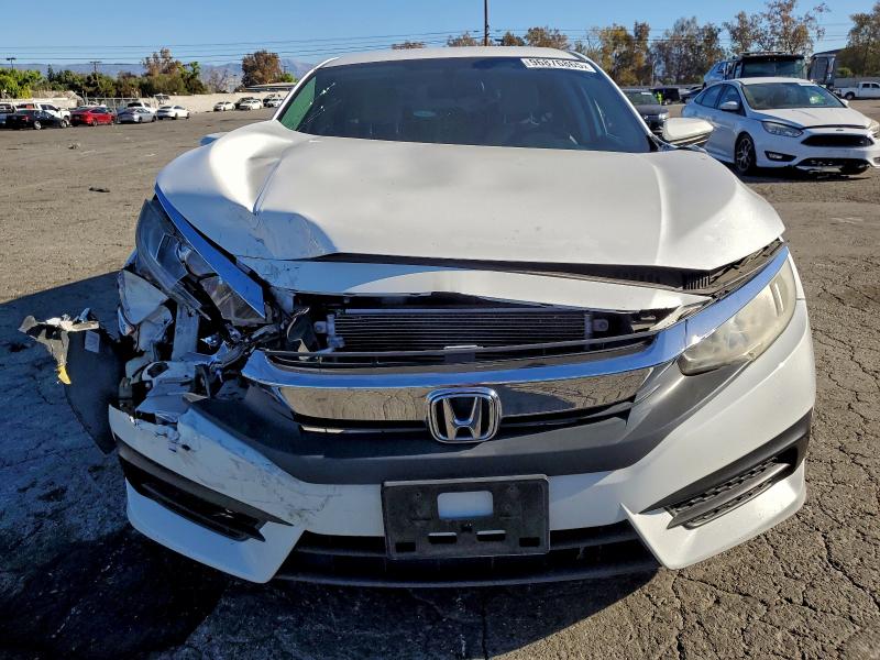 Photo 5 from auction – 2016 HONDA CIVIC LX with VIN 2HGFC2F58GH538078