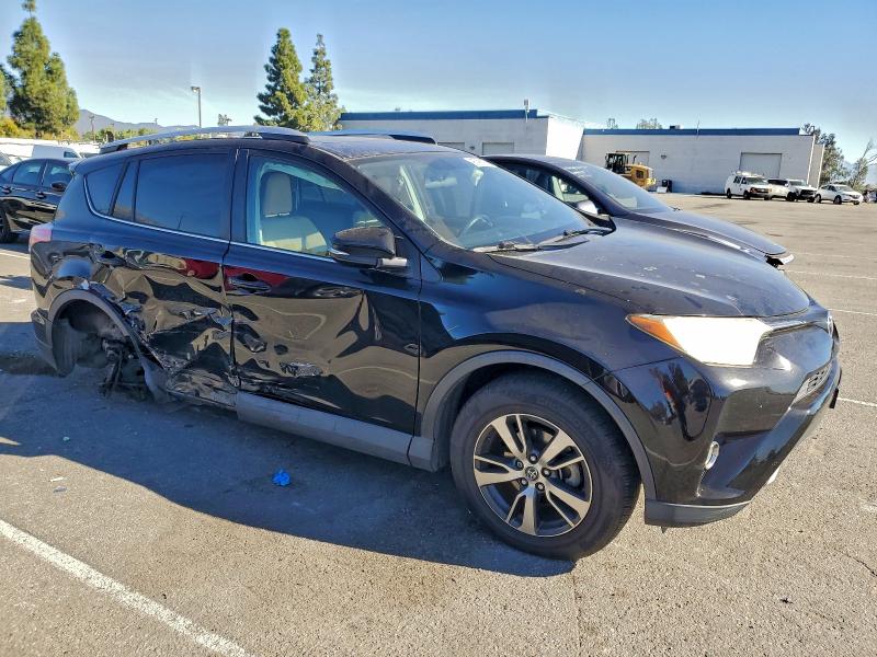 Photo 4 from auction – 2016 TOYOTA RAV4 XLE with VIN 2T3WFREV3GW283193