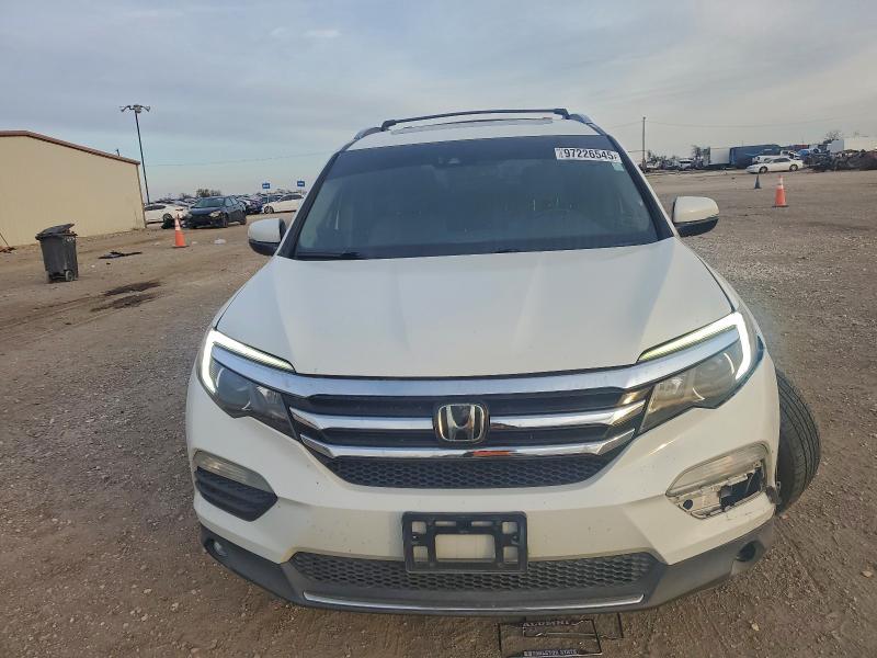 Photo 5 from auction – 2018 HONDA PILOT ELIT with VIN 5FNYF6H01JB022410