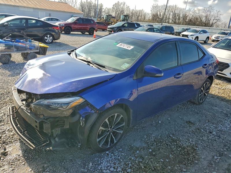 TOYOTA COROLLA L 2018 with VIN 5YFBURHE9JP744334 - Photo from auction
