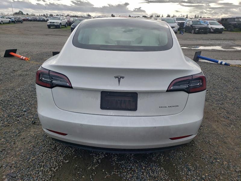 Photo 6 from auction – 2022 TESLA MODEL 3 with VIN 5YJ3E1EB7NF129828