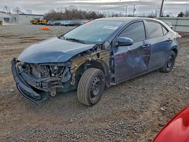 TOYOTA COROLLA 2018 with VIN 5YFBURHE5JP849002 - Photo from auction