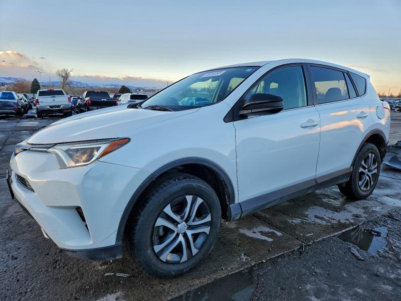 TOYOTA RAV4 LE 2018 with VIN 2T3BFREV8JW752882 - Photo from auction