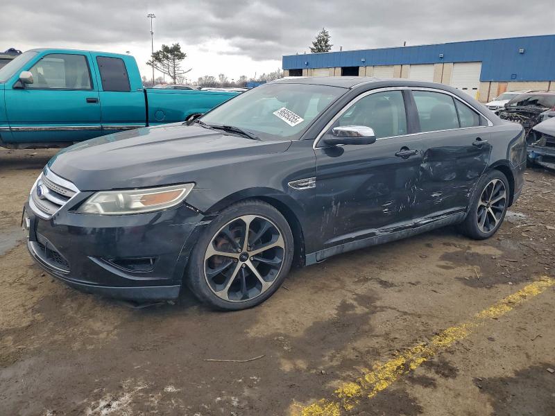 FORD TAURUS LIM 2012 with VIN 1FAHP2JWXCG131631 - Photo from auction