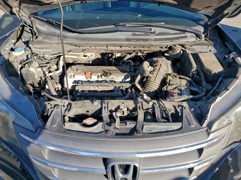 Photo 12 from auction – 2014 HONDA CR-V LX with VIN 2HKRM3H32EH514860