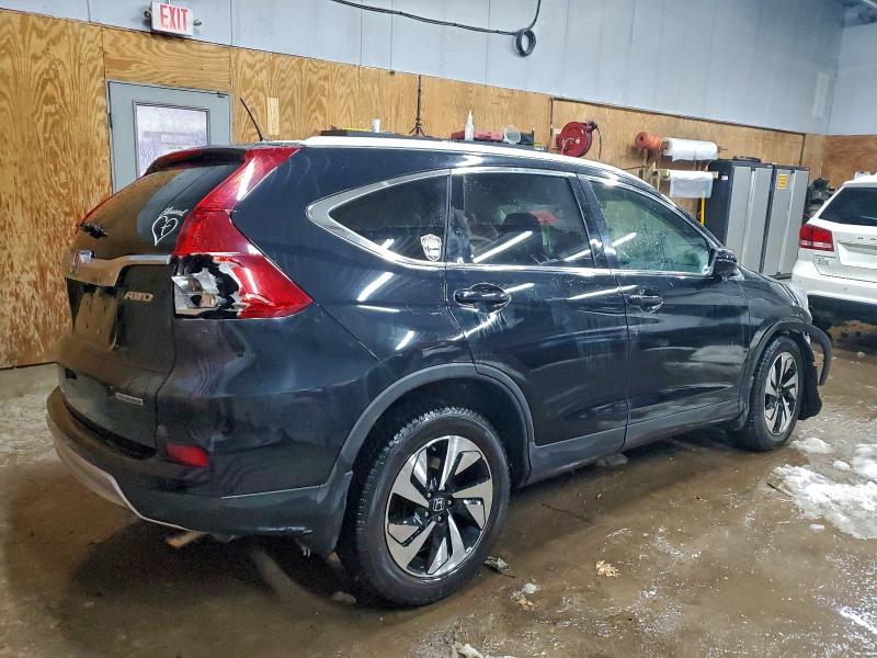 Photo 3 from auction – 2016 HONDA CR-V TOURI with VIN 5J6RM4H90GL047702
