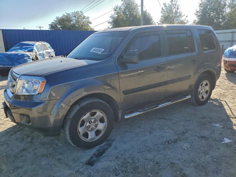 HONDA PILOT LX 2011 with VIN 5FNYF3H23BB007649 - Photo from auction