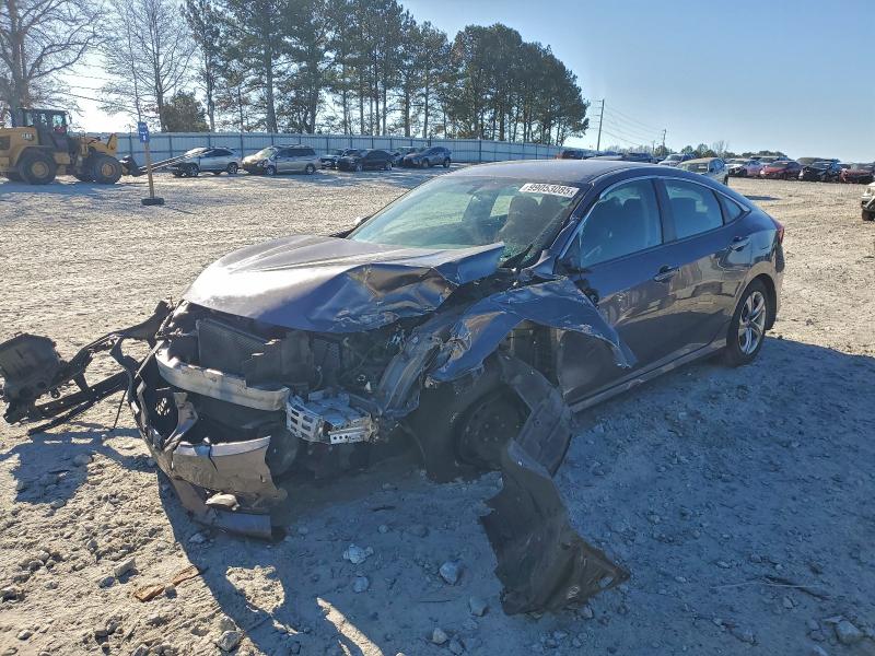 HONDA CIVIC LX 2017 with VIN 19XFC2F51HE009759 - Photo from auction