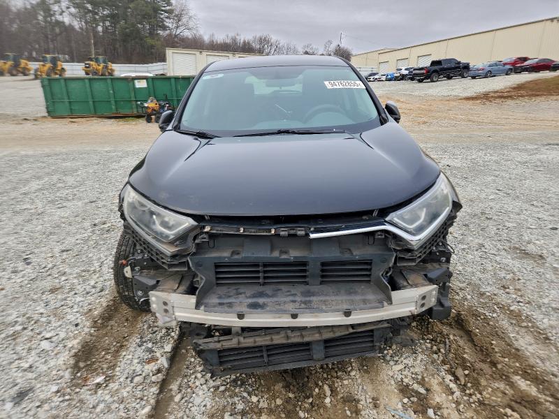 Photo 5 from auction – 2017 HONDA CR-V LX with VIN 7FARW5H34HE011232
