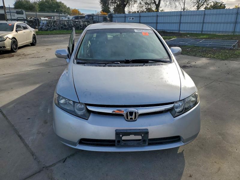 Photo 5 from auction – 2006 HONDA CIVIC HYBR with VIN JHMFA36256S023027