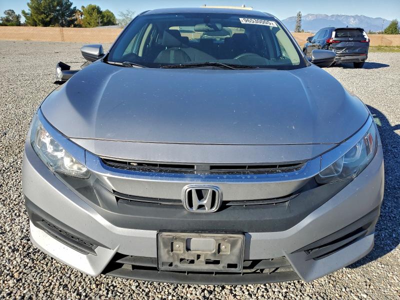 Photo 5 from auction – 2018 HONDA CIVIC LX with VIN 2HGFC2F52JH598090