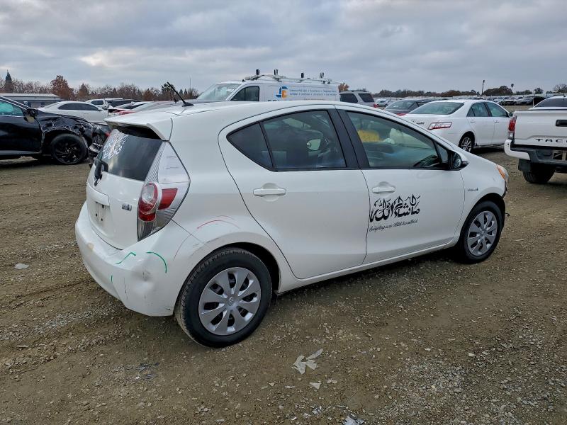 Photo 3 from auction – 2014 TOYOTA PRIUS C with VIN JTDKDTB32E1569102