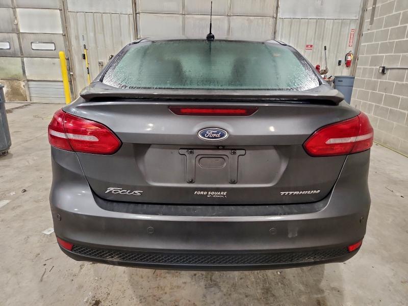 Photo 6 from auction – 2018 FORD FOCUS TITA with VIN 1FADP3J24JL294751