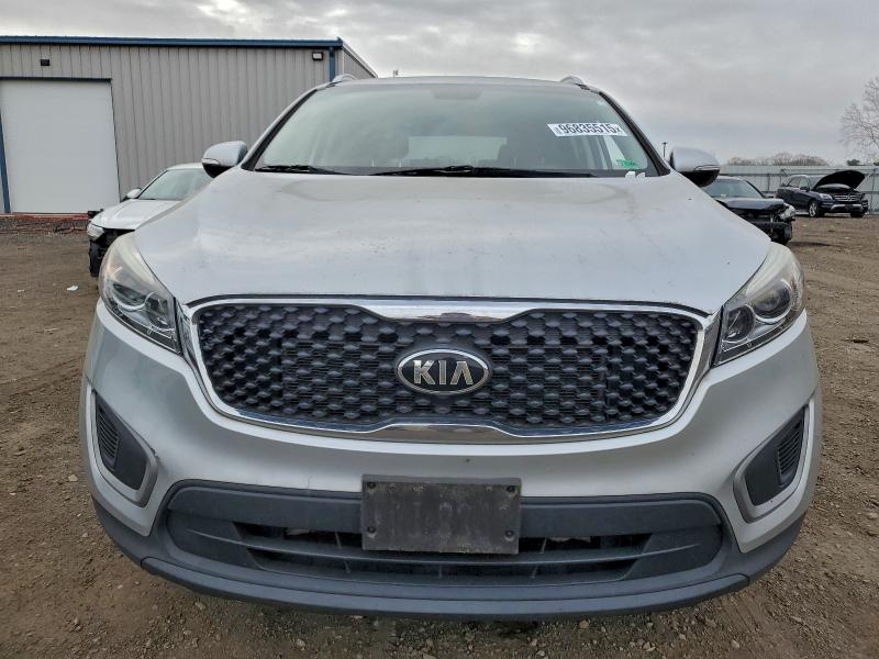 Photo 5 from auction – 2016 KIA SORENTO LX with VIN 5XYPG4A35GG123971