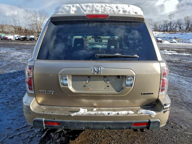 Photo 6 from auction – 2006 HONDA PILOT EX with VIN 5FNYF18556B013845