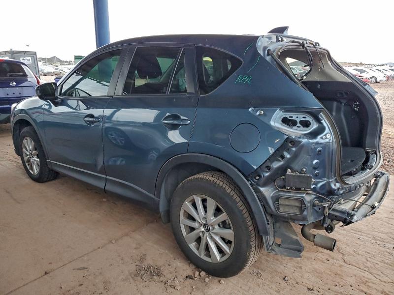 Photo 2 from auction – 2015 MAZDA CX-5 TOURI with VIN JM3KE2CY3F0453729