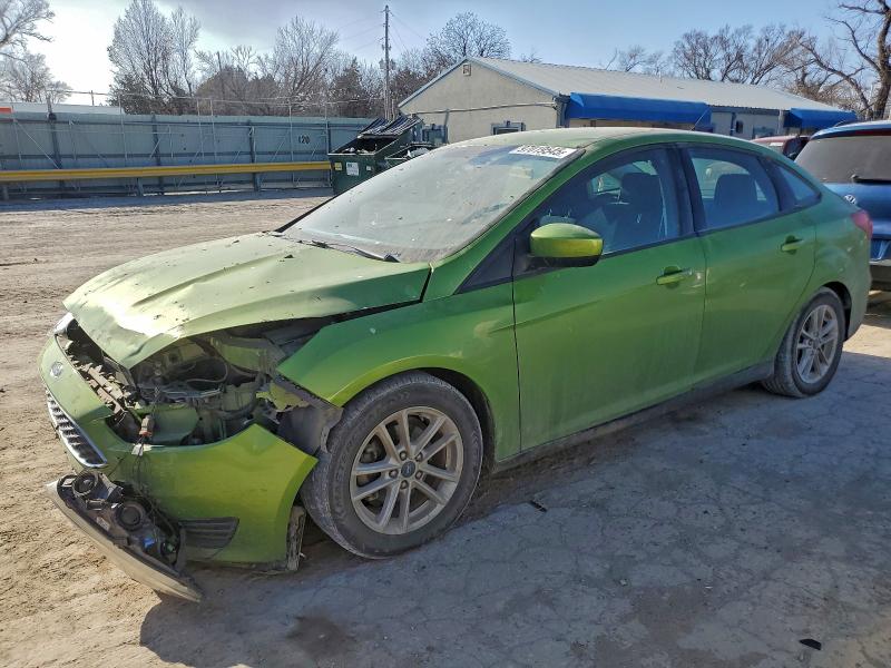 FORD FOCUS 2018 with VIN 1FADP3F27JL259999 - Photo from auction