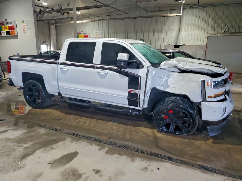 Photo 4 from auction – 2018 CHEVROLET SILVERADO with VIN 3GCUKREC5JG371901