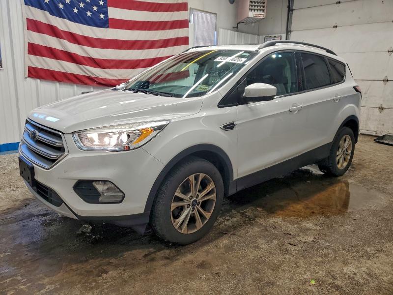 FORD ESCAPE 2018 with VIN 1FMCU9HD3JUA06135 - Photo from auction