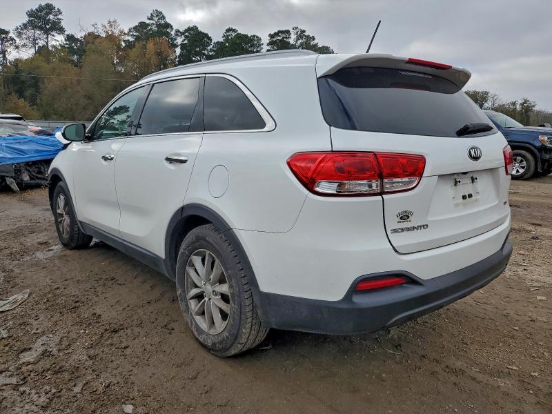 Photo 2 from auction – 2016 KIA SORENTO LX with VIN 5XYPG4A37GG095705