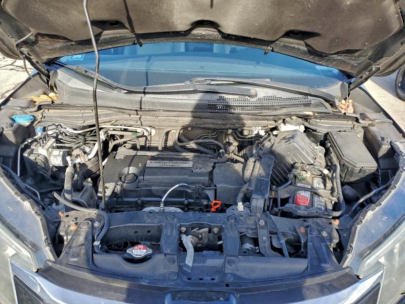 Photo 12 from auction – 2015 HONDA CR-V EX with VIN 2HKRM4H56FH677990