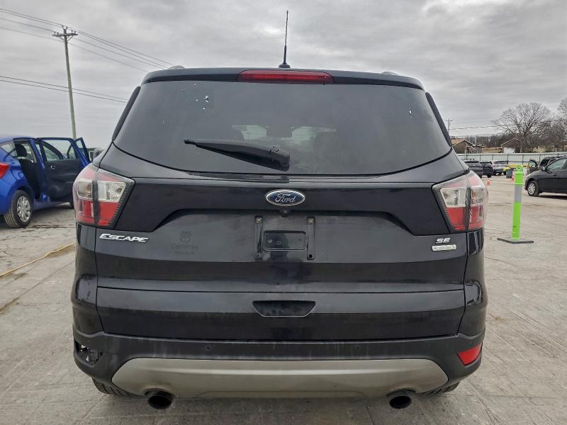 Photo 6 from auction – 2017 FORD ESCAPE SE with VIN 1FMCU0G99HUA85068