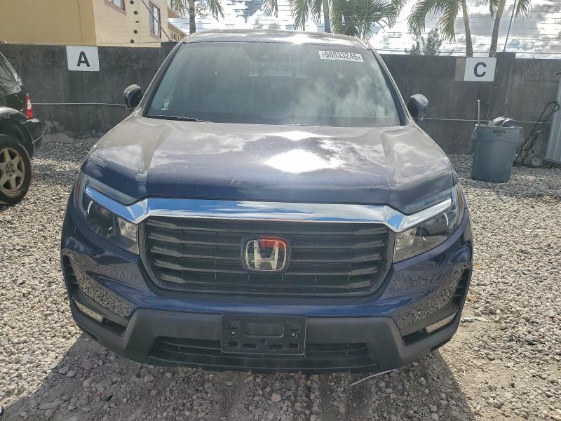Photo 5 from auction – 2022 HONDA RIDGELINE with VIN 5FPYK3F76NB009532