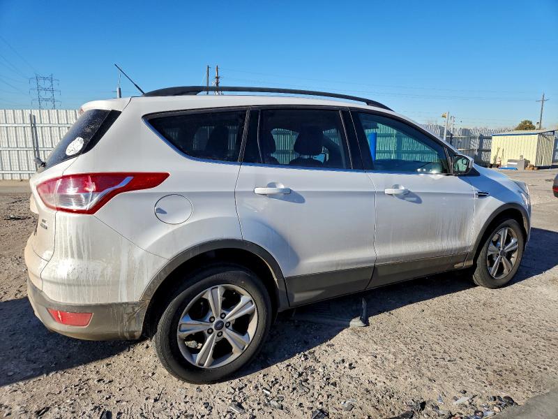 Photo 3 from auction – 2015 FORD ESCAPE SE with VIN 1FMCU9GX4FUB55124