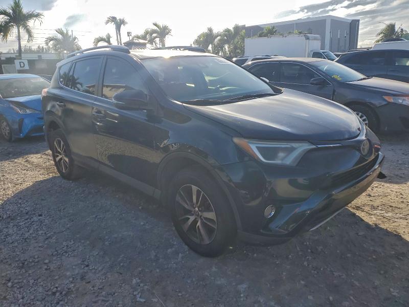 Photo 4 from auction – 2017 TOYOTA RAV4 XLE with VIN JTMWFREVXHJ100727