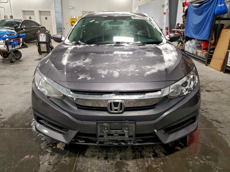 Photo 5 from auction – 2016 HONDA CIVIC LX with VIN 2HGFC2F55GH038606