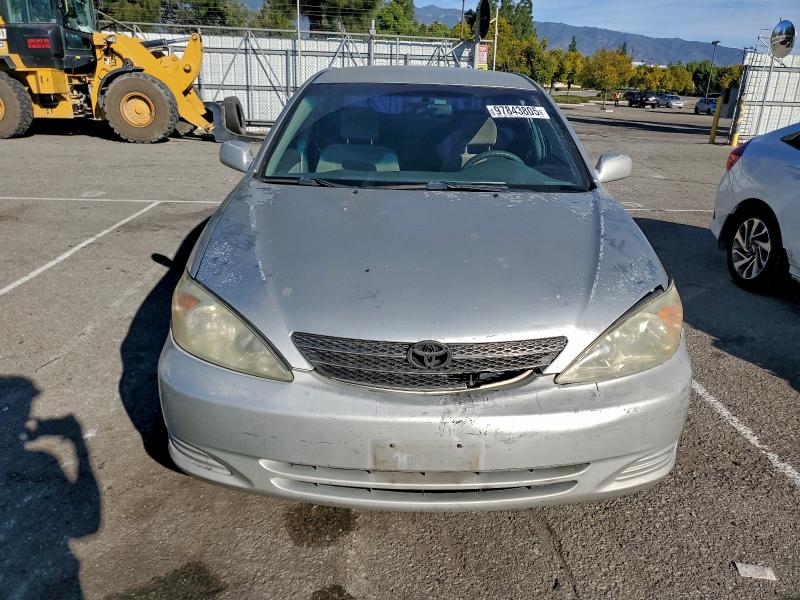Photo 5 from auction – 2003 TOYOTA CAMRY LE with VIN 4T1BE32K13U762398