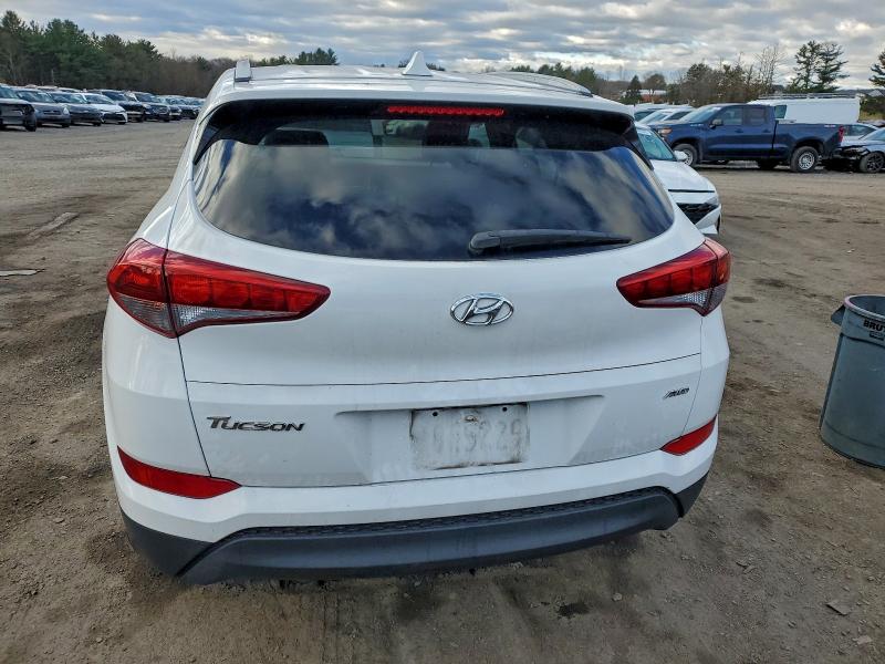 Photo 6 from auction – 2018 HYUNDAI TUCSON SEL with VIN KM8J3CA40JU758442