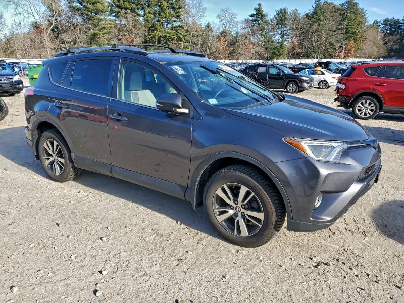 Photo 4 from auction – 2017 TOYOTA RAV4 XLE with VIN JTMRFREV9HJ165758