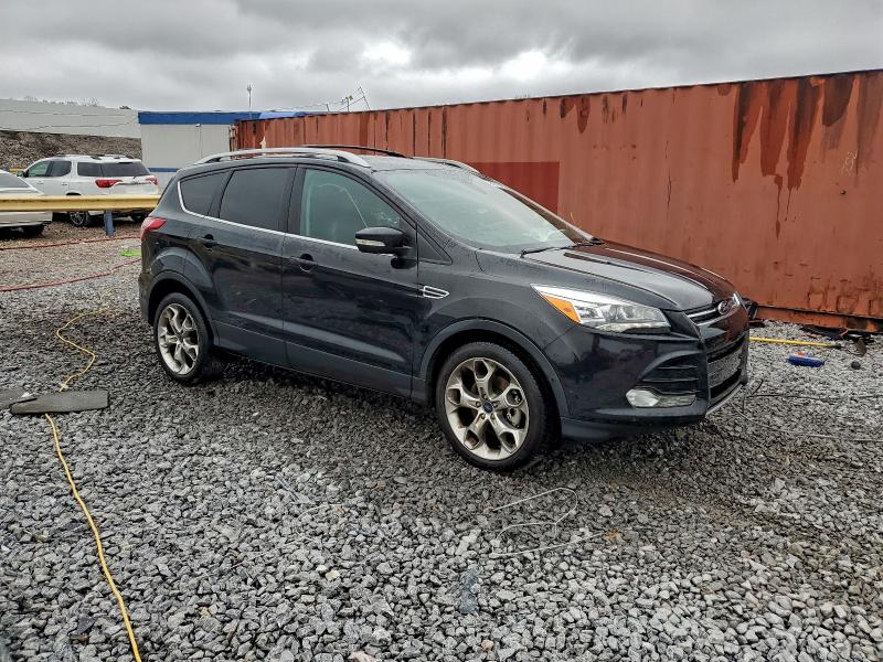 Photo 4 from auction – 2014 FORD ESCAPE TIT with VIN 1FMCU0J90EUA18976