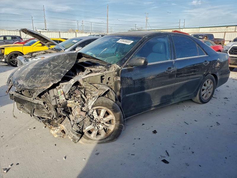 TOYOTA CAMRY LE 2003 with VIN 4T1BF32K53U048450 - Photo from auction