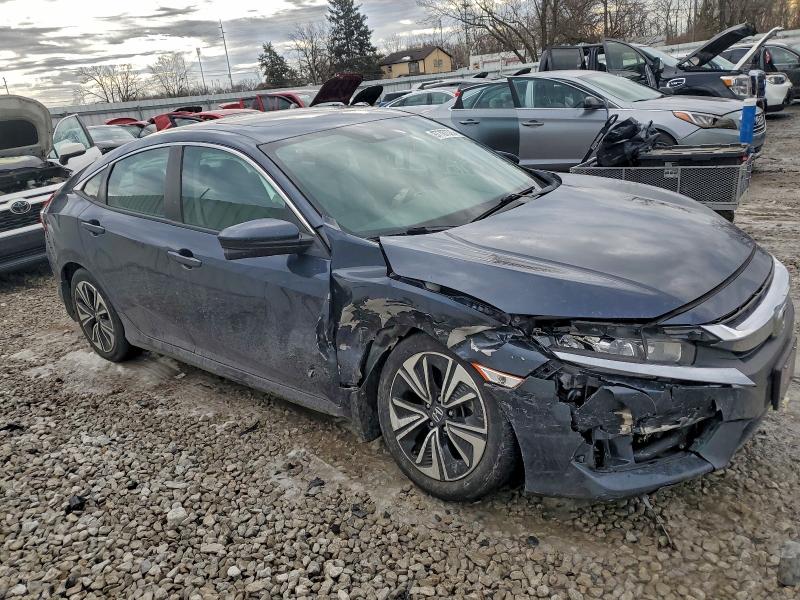 Photo 4 from auction – 2017 HONDA CIVIC EX with VIN 2HGFC1F40HH631115