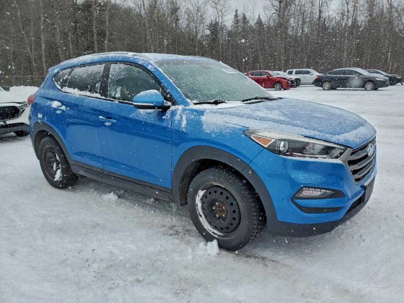 Photo 4 from auction – 2016 HYUNDAI TUCSON LIM with VIN KM8J33A40GU179086