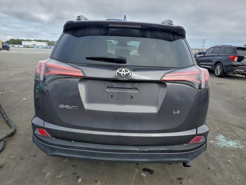 Photo 6 from auction – 2018 TOYOTA RAV4 LE with VIN 2T3ZFREV9JW452007