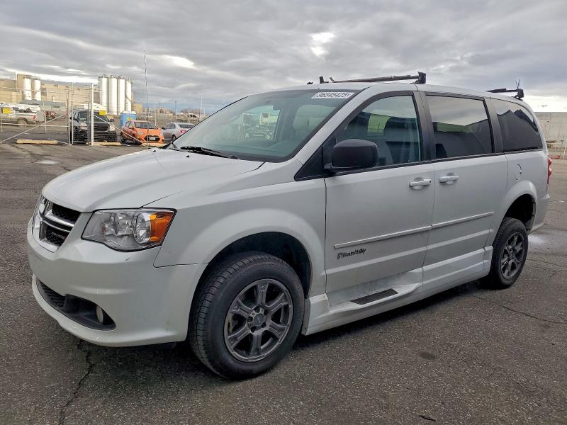 DODGE GRAND CARA 2016 with VIN 2C7WDGBGXGR396992 - Photo from auction