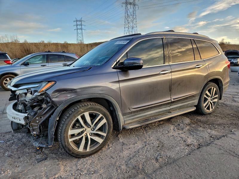 HONDA PILOT ELIT 2016 with VIN 5FNYF6H01GB033237 - Photo from auction