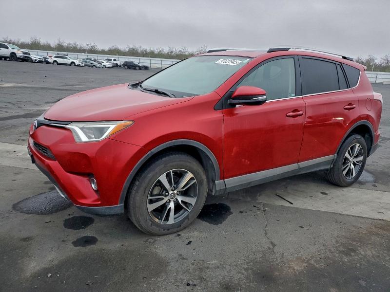 TOYOTA RAV4 XLE 2016 with VIN 2T3RFREV9GW500873 - Photo from auction