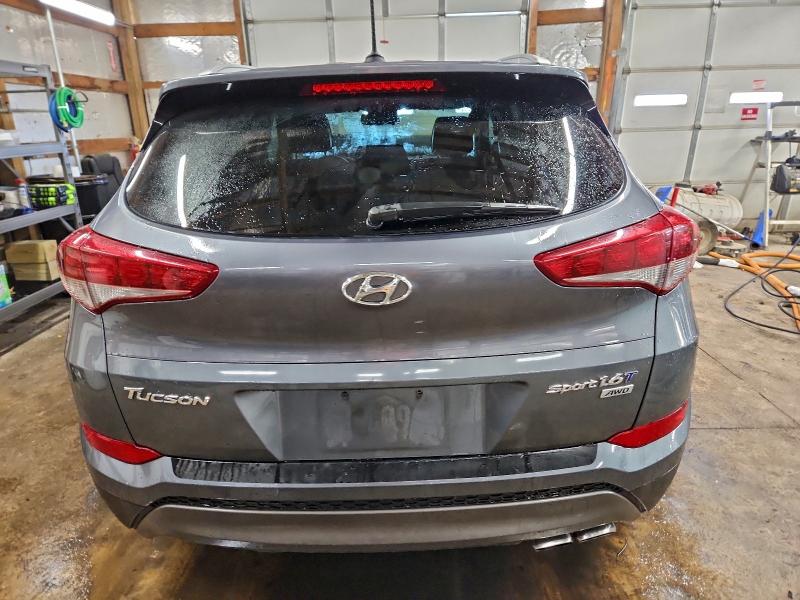 Photo 6 from auction – 2016 HYUNDAI TUCSON LIM with VIN KM8J3CA26GU123152