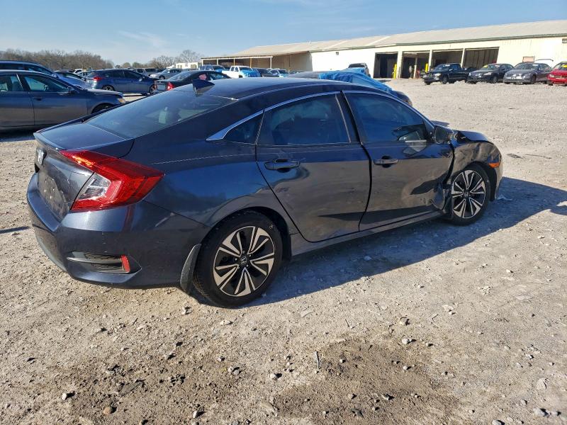 Photo 3 from auction – 2016 HONDA CIVIC EX with VIN 19XFC1F31GE012233