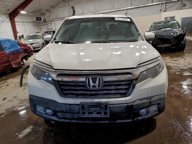 Photo 5 from auction – 2019 HONDA RIDGELINE with VIN 5FPYK3F61KB021168