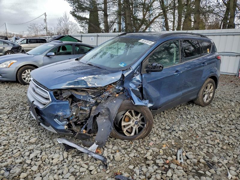 FORD ESCAPE SE 2018 with VIN 1FMCU9GD7JUB79089 - Photo from auction