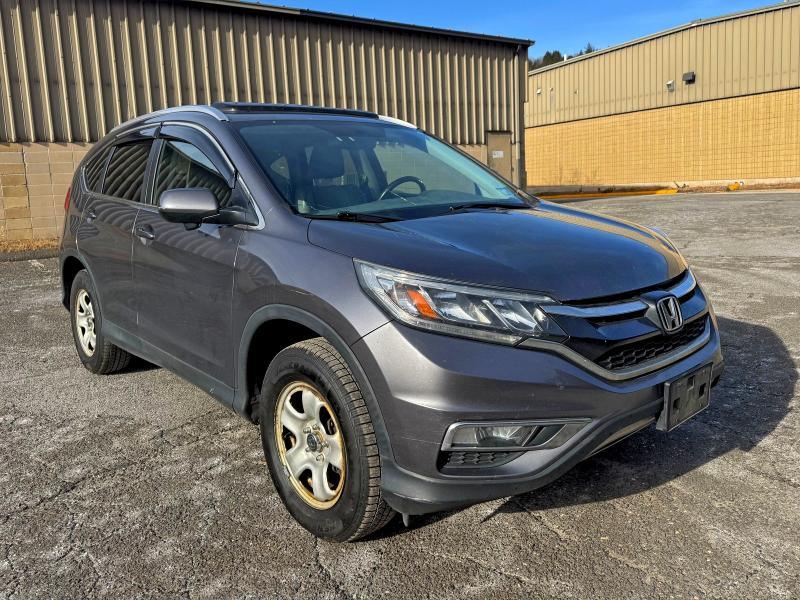 HONDA CR-V EXL 2015 with VIN 2HKRM4H76FH661192 - Photo from auction