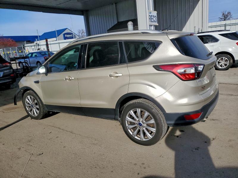 Photo 2 from auction – 2017 FORD ESCAPE TIT with VIN 1FMCU0JD6HUB42226
