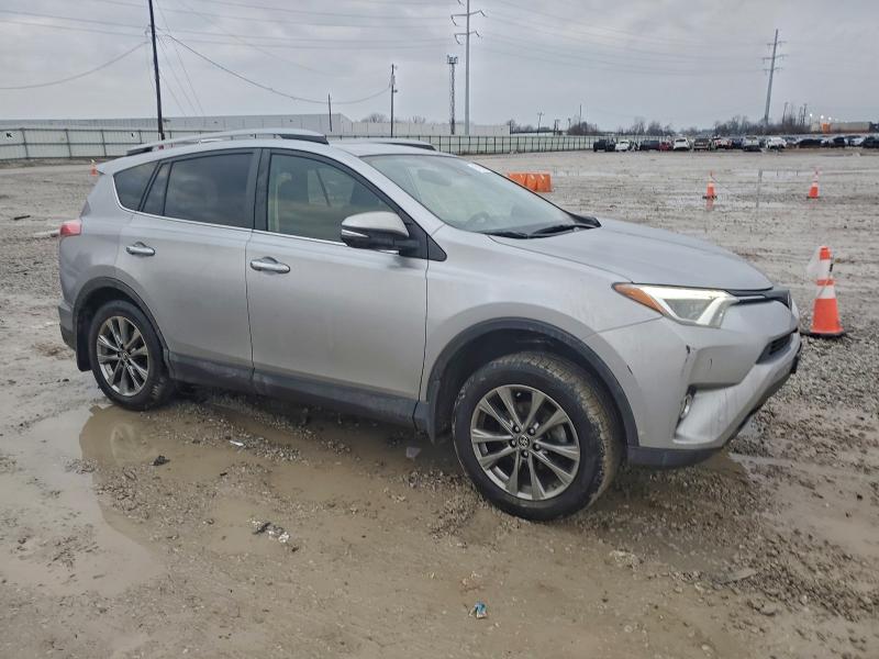 Photo 4 from auction – 2018 TOYOTA RAV4 LIMIT with VIN JTMDFREV1JJ211311